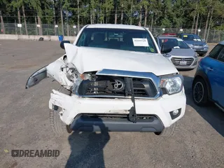 2015 Toyota Tacoma with VIN 3TMLU4EN5FM182720, listed as a IAAI auction lot 42555728 with 183,081 mi miles and . Bid and sale history available at DreamBid. Image 12.