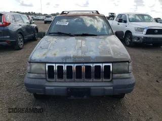 1997 Jeep Grand Cherokee Laredo z VIN 1J4GZ58S4VC502596, wystawiony jako Copart lot #88255865 z przebiegiem Nie podano mil oraz Nie do naprawy • Non repairable. Historia ofert i sprzedaży dostępna na DreamBid. Obrazek 5.