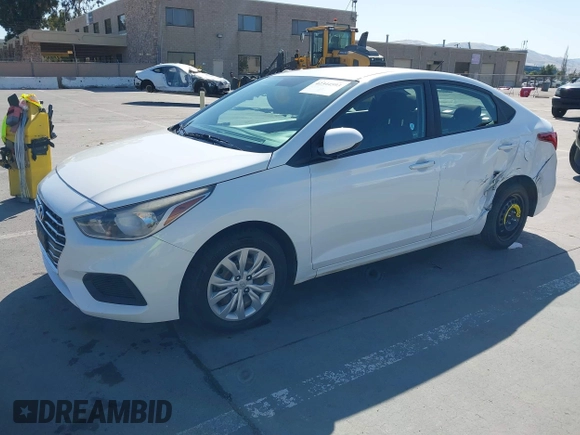 2021 Hyundai Accent SE z VIN 3KPC24A6XME153337, wystawiony jako IAAI lot #42344593 z przebiegiem 86 079 mil mil oraz . Historia ofert i sprzedaży dostępna na DreamBid. Obrazek 2.