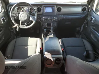 2023 Jeep Wrangler Sport with VIN 1C4HJXDG9PW699538, listed as a Copart auction lot 44275595 with 23,331 mi miles and Clean Title. Bid and sale history available at DreamBid. Image 8.