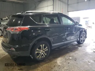 2017 Toyota RAV4 LE with VIN 2T3BFREV7HW601557, listed as a Copart auction lot 46050215 with 128,757 mi miles and Salvage Title. Bid and sale history available at DreamBid. Image 3.