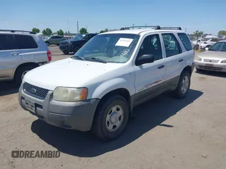 2001 Ford Escape XLS with VIN 1FMYU021X1KA59670, listed as a IAAI auction lot 42551801 with 189,058 mi miles and . Bid and sale history available at DreamBid. Image 2.