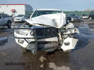 2014 Toyota Tacoma with VIN 3TMLU4ENXEM134872, listed as a IAAI auction lot 41303669 with 167,548 mi miles. Bid and sale history available at carsss.com. Image 6.