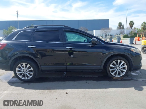 2015 Mazda CX-9 Grand Touring z VIN JM3TB2DA4F0450014, wystawiony jako IAAI lot #41692935 z przebiegiem 90 800 mil mil oraz . Historia ofert i sprzedaży dostępna na DreamBid. Obrazek 13.