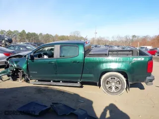2015 Chevrolet Colorado 4WD Z71 with VIN 1GCGTCE31F1163947, listed as a IAAI auction lot 40997814 with 101,884 mi miles. Bid and sale history available at carsss.com. Image 14.