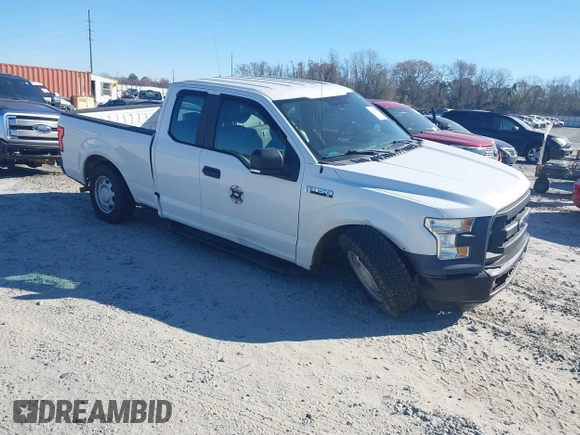 2015 Ford F-150 XL with VIN 1FTEX1C86FFB98582, listed as a IAAI auction lot 41678059 with 76,424 mi miles. Bid and sale history available at carsss.com. Image 1.