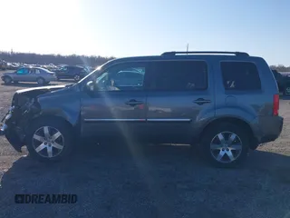 2012 Honda Pilot Touring with VIN 5FNYF3H9XCB042090, listed as a IAAI auction lot 41751359 with 140,424 mi miles and . Bid and sale history available at carsss.com. Image 14.
