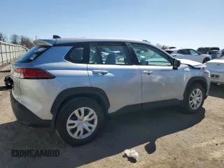 2022 Toyota Corolla Cross L with VIN 7MUAAABG0NV011057, listed as a Copart auction lot 50907545 with 59,328 mi miles and Salvage title. Bid and sale history available at DreamBid. Image 3.