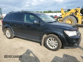 2015 Dodge Journey SXT with VIN 3C4PDCCG5FT559021, listed as a Copart auction lot 60101335 with 323,930 mi miles and Salvage title. Bid and sale history available at DreamBid. Image 4.