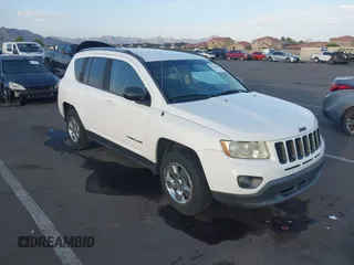 2013 Jeep Compass Sport with VIN 1C4NJCBA1DD272937, listed as a IAAI auction lot 39855648 with 118,136 mi miles. Bid and sale history available at carsss.com. Image 1.