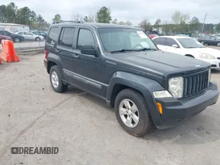 2011 Jeep Liberty Sport Jet with VIN 1J4PN2GKXBW538945, listed as a IAAI auction lot 41955317 with 133,772 mi miles. Bid and sale history available at carsss.com. Image 1.