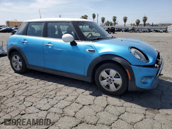 2015 MINI Hardtop 4 Door z VIN WMWXS5C5XFT827473, wystawiony jako Copart lot #58261135 z przebiegiem 75 439 mil mil oraz Szkoda całkowita • Salvage title. Historia ofert i sprzedaży dostępna na DreamBid. Obrazek 4.