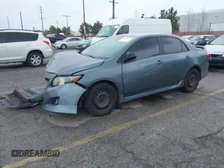 2009 Toyota Corolla with VIN 1NXBU40E49ZO81912, listed as a IAAI auction lot 41806599 with 216,989 mi miles. Bid and sale history available at carsss.com. Image 2.
