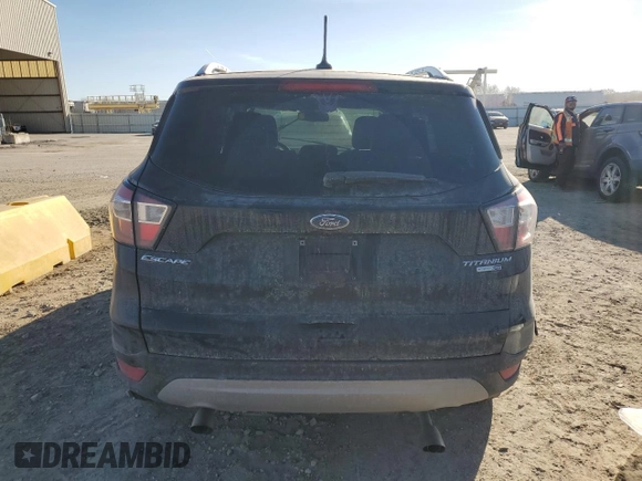 2018 Ford Escape Titanium with VIN 1FMCU9J95JUA36324, listed as a Copart auction lot 47131825 with 63,563 mi miles and Salvage title. Bid and sale history available at DreamBid. Image 6.