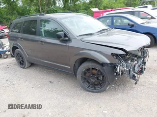 2014 Dodge Journey SXT z VIN 3C4PDDBG2ET174313, wystawiony jako IAAI lot #42340294 z przebiegiem 125 641 mil mil oraz . Historia ofert i sprzedaży dostępna na DreamBid. Obrazek 1.
