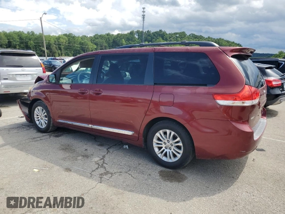 2012 Toyota Sienna XLE AAS with VIN 5TDYK3DC1CS233762, listed as a Copart auction lot 59224495 with 116,155 mi miles and Salvage title. Bid and sale history available at DreamBid. Image 2.