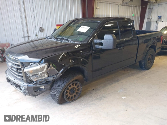 2015 Ford F-150 XLT z VIN 1FTFX1EFXFKE32133, wystawiony jako IAAI lot #42260644 z przebiegiem 136 724 mil mil oraz . Historia ofert i sprzedaży dostępna na DreamBid. Obrazek 17.