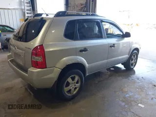 2007 Hyundai Tucson GLS with VIN KM8JM12B07U567384, listed as a IAAI auction lot 41779454 with 152,660 mi miles. Bid and sale history available at carsss.com. Image 4.