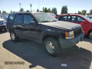 1998 Jeep Grand Cherokee Laredo with VIN 1J4GZ58Y4WC109610, listed as a Copart auction lot 58705124 with 247,990 mi miles and Salvage Title. Bid and sale history available at carsss.com. Image 4.