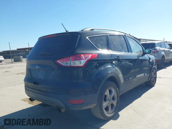 2016 Ford Escape SE with VIN 1FMCU0G99GUC19883, listed as a IAAI auction lot 41726858 with 156,863 mi miles. Bid and sale history available at carsss.com. Image 4.