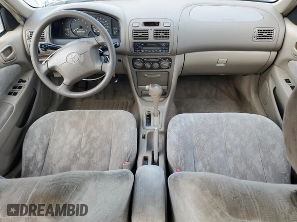 1999 Toyota Corolla VE with VIN 2T1BR12E7XC113103, listed as a Copart auction lot 63849025 with 104,830 mi miles and Salvage title. Bid and sale history available at DreamBid. Image 8.
