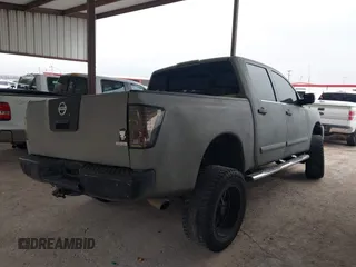 2008 Nissan Titan XE with VIN 1N6BA07DX8N339911, listed as a IAAI auction lot 41539937 with 242,659 mi miles. Bid and sale history available at carsss.com. Image 4.