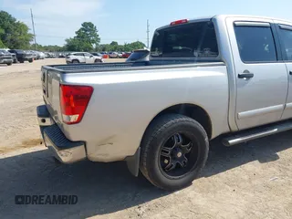 2012 Nissan Titan SV with VIN 1N6BA0ED8CN320723, listed as a IAAI auction lot 42642482 with 214,941 mi miles and . Bid and sale history available at DreamBid. Image 6.