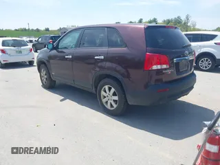 2011 Kia Sorento LX with VIN 5XYKTCA19BG008104, listed as a IAAI auction lot 42250877 with 121,288 mi miles and . Bid and sale history available at DreamBid. Image 3.