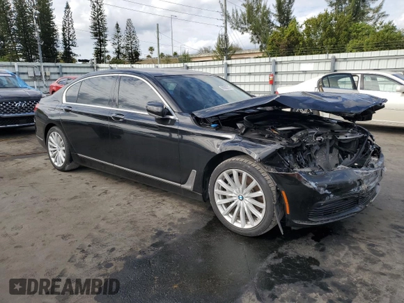 2018 BMW 7 Series 740i with VIN WBA7E2C59JB216290, listed as a Copart auction lot 89082215 with 56,020 mi miles and Salvage Title. Bid and sale history available at carsss.com. Image 4.