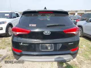 2018 Hyundai Tucson Sport z VIN KM8J33AL5JU741563, wystawiony jako IAAI lot #41928357 z przebiegiem 97 004 mil mil oraz . Historia ofert i sprzedaży dostępna na DreamBid. Obrazek 16.