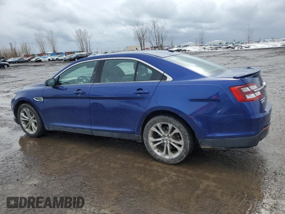 2013 Ford Taurus SEL with VIN 1FAHP2H80DG115530, listed as a Copart auction lot 50353005 with 194,515 mi miles and Salvage Title. Bid and sale history available at DreamBid. Image 2.