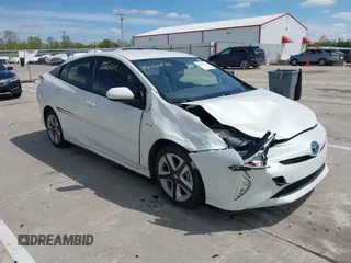 2016 Toyota Prius Four z VIN JTDKARFU6G3004339, wystawiony jako IAAI lot #42160545 z przebiegiem 140 452 mil mil oraz . Historia ofert i sprzedaży dostępna na DreamBid. Obrazek 1.