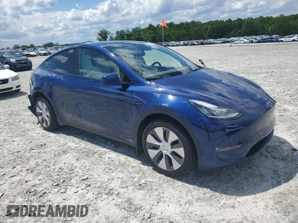2022 Tesla Model Y Long Range z VIN 7SAYGDEE4NF426893, wystawiony jako Copart lot #55809275 z przebiegiem 16 083 mil mil oraz Szkoda całkowita • Salvage title. Historia ofert i sprzedaży dostępna na DreamBid. Obrazek 4.