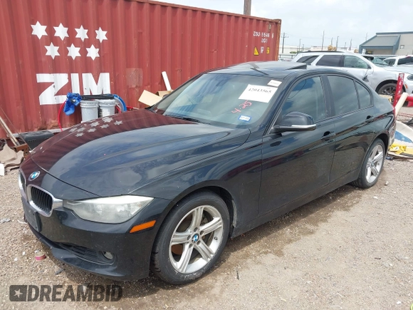 2015 BMW 3 Series 328i with VIN WBA3C1C5XFP852807, listed as a IAAI auction lot 42043565 with 120,048 mi miles and . Bid and sale history available at carsss.com. Image 2.