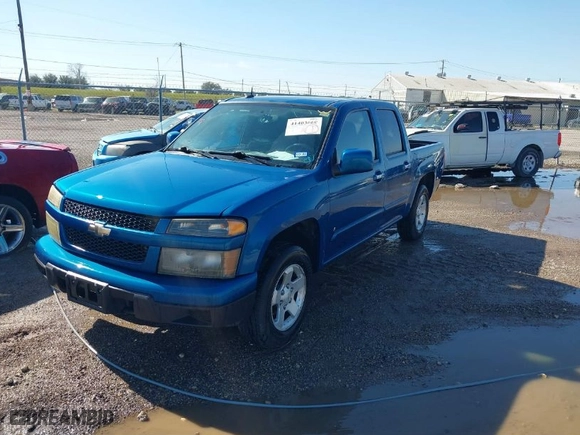 2009 Chevrolet Colorado LT w/1LT with VIN 1GCCS139698111402, listed as a IAAI auction lot 41403660 with 160,695 mi miles. Bid and sale history available at carsss.com. Image 2.