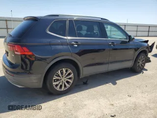 2018 Volkswagen Tiguan S with VIN 3VV1B7AXXJM069099, listed as a Copart auction lot 52345235 with 79,359 mi miles and Salvage title. Bid and sale history available at DreamBid. Image 3.