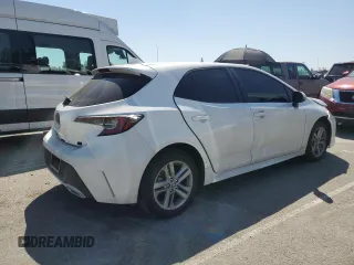 2022 Toyota Corolla Hatchback SE with VIN JTND4MBE5N3148944, listed as a Copart auction lot 52324435 with 55,206 mi miles and Salvage Title. Bid and sale history available at carsss.com. Image 3.