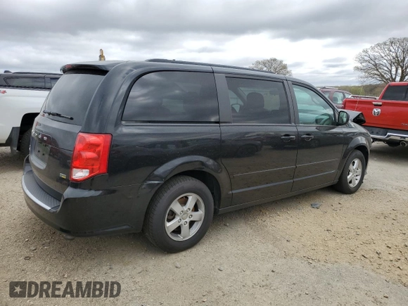 2012 Dodge Grand Caravan SXT with VIN 2C4RDGCG5CR253449, listed as a Copart auction lot 54592975 with 86,200 mi miles and Non Repairable. Bid and sale history available at DreamBid. Image 3.