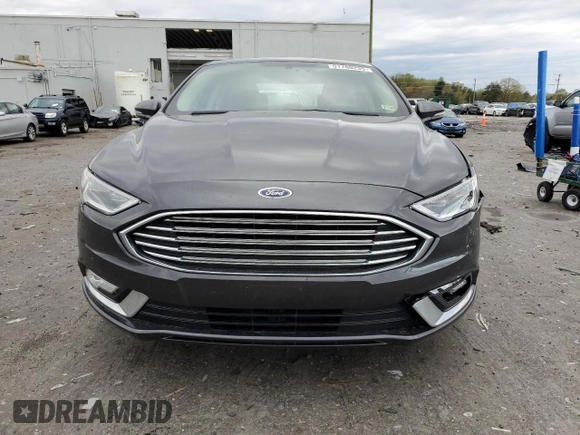 2017 Ford Fusion SE with VIN 3FA6P0H98HR120168, listed as a Copart auction lot 51760235 with 124,791 mi miles and Salvage Title. Bid and sale history available at DreamBid. Image 5.