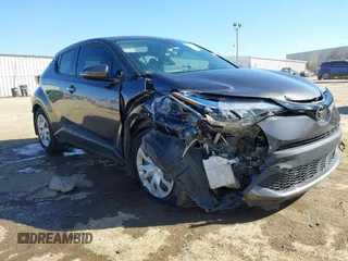 2021 Toyota C-HR LE with VIN JTNKHMBX9M1106980, listed as a IAAI auction lot 41645554 with 52,181 mi miles. Bid and sale history available at carsss.com. Image 1.