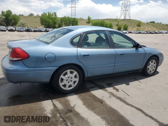 2006 Ford Taurus SE with VIN 1FAHP53296A241444, listed as a Copart auction lot 58343615 with 125,385 mi miles and Salvage title. Bid and sale history available at DreamBid. Image 3.