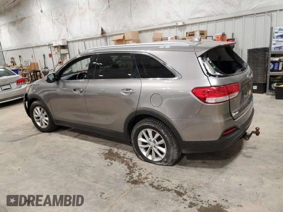 2018 Kia Sorento LX with VIN 5XYPG4A5XJG374879, listed as a Copart auction lot 53319395 with 121,443 mi miles and Clean Title. Bid and sale history available at DreamBid. Image 2.