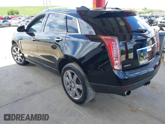 2012 Cadillac SRX Premium Collection z VIN 3GYFNCE36CS615725, wystawiony jako IAAI lot #42738584 z przebiegiem 156 625 mil mil oraz . Historia ofert i sprzedaży dostępna na DreamBid. Obrazek 3.