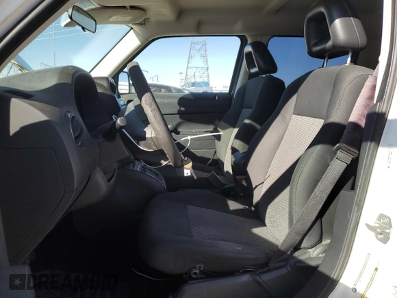 2009 Jeep Patriot Sport with VIN 1J4FT28A29D126337, listed as a Copart auction lot 46438905 with 150,111 mi miles and Salvage Title. Bid and sale history available at DreamBid. Image 7.