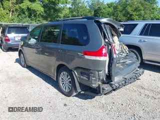 2011 Toyota Sienna XLE AAS with VIN 5TDYK3DC4BS136568, listed as a IAAI auction lot 42639252 with 239,020 mi miles and . Bid and sale history available at DreamBid. Image 3.