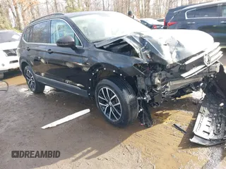 2021 Volkswagen Tiguan SE with VIN 3VV2B7AX7MM050891, listed as a IAAI auction lot 41519674 with 43,318 mi miles and . Bid and sale history available at DreamBid. Image 1.