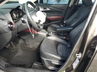 2017 Mazda CX-3 Touring z VIN JM1DKDC71H0172044, wystawiony jako Copart lot #56465125 z przebiegiem 119 374 mil mil oraz Szkoda całkowita • Salvage title. Historia ofert i sprzedaży dostępna na DreamBid. Obrazek 7.