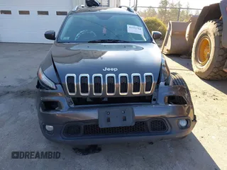 2015 Jeep Cherokee Latitude with VIN 1C4PJMCSXFW725644, listed as a IAAI auction lot 41312764 with 191,714 mi miles and . Bid and sale history available at DreamBid. Image 13.