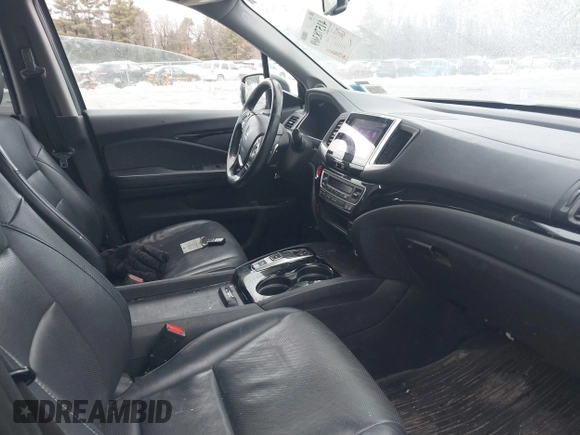 2020 Honda Ridgeline RTL-E with VIN 5FPYK3F70LB015422, listed as a IAAI auction lot 41578369 with 78,860 mi miles and . Bid and sale history available at DreamBid. Image 5.