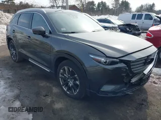 2016 Mazda CX-9 Grand Touring with VIN JM3TCBDY3G0109201, listed as a IAAI auction lot 41705355 with 92,657 mi miles and . Bid and sale history available at carsss.com. Image 1.